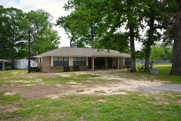 52.2 Acres of Recreational Land with Home for Sale in Kirbyville, Texas