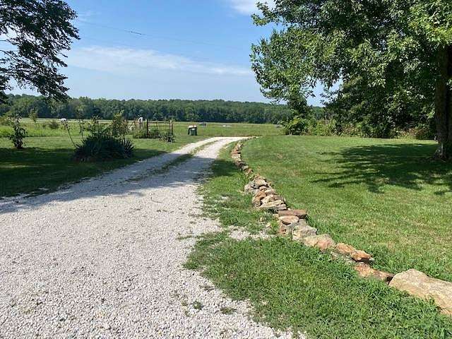 3 Acres of Residential Land with Home for Sale in Humansville, Missouri