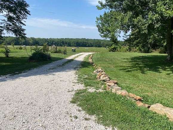 3 Acres of Residential Land with Home for Sale in Humansville, Missouri