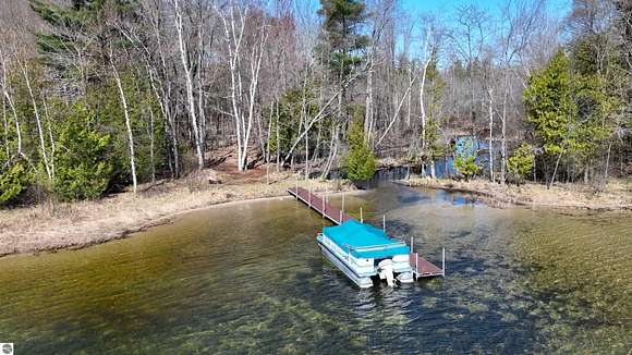 75 Acres of Recreational Land with Home for Sale in Grawn, Michigan