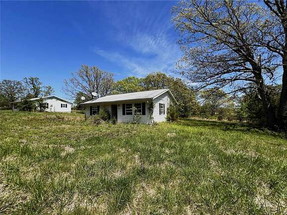 10.4 Acres of Land with Home for Sale in Plato, Missouri