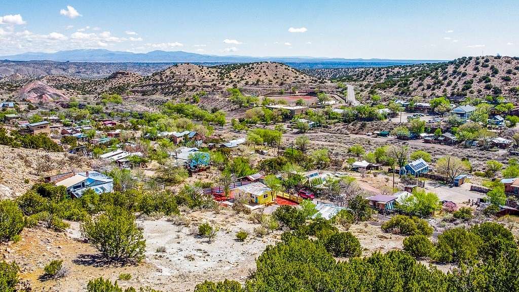 1 Acre of Residential Land with Home for Sale in Madrid, New Mexico