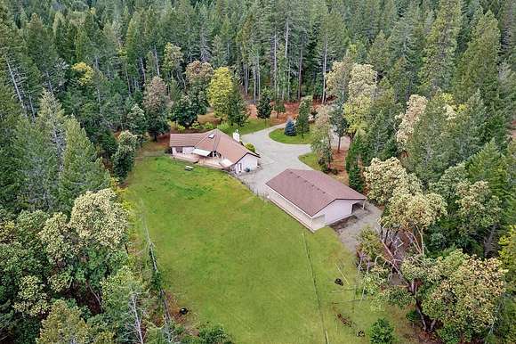 5.2 Acres of Residential Land with Home for Sale in Cave Junction, Oregon