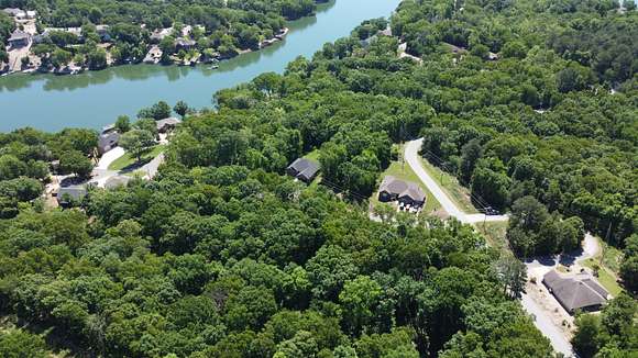 Ariel view of property and lake