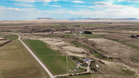 64.5 Acres of Agricultural Land with Home for Sale in Fort Shaw, Montana