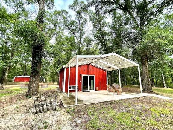 21.4 Acres of Recreational Land with Home for Sale in Live Oak, Florida