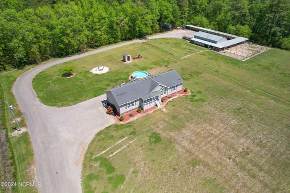 20.4 Acres of Recreational Land with Home for Sale in Camden, North Carolina