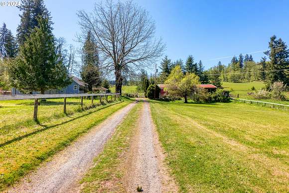 14.5 Acres of Land with Home for Sale in Rainier, Oregon