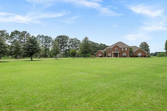 4.6 Acres of Residential Land with Home for Sale in Carriere, Mississippi