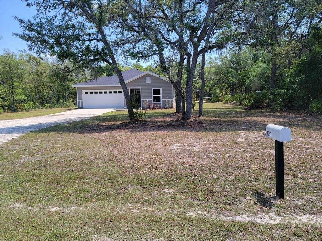 2.41 Acres of Residential Land with Home for Sale in Bronson, Florida