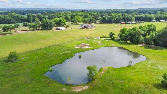 40.4 Acres of Agricultural Land with Home for Sale in Elkhart, Texas