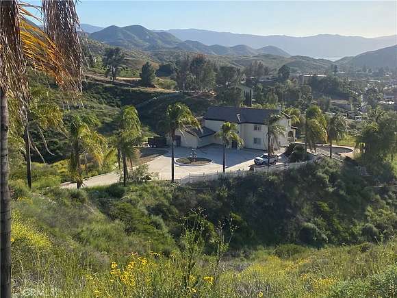 4.8 Acres of Residential Land with Home for Sale in Canyon Lake, California