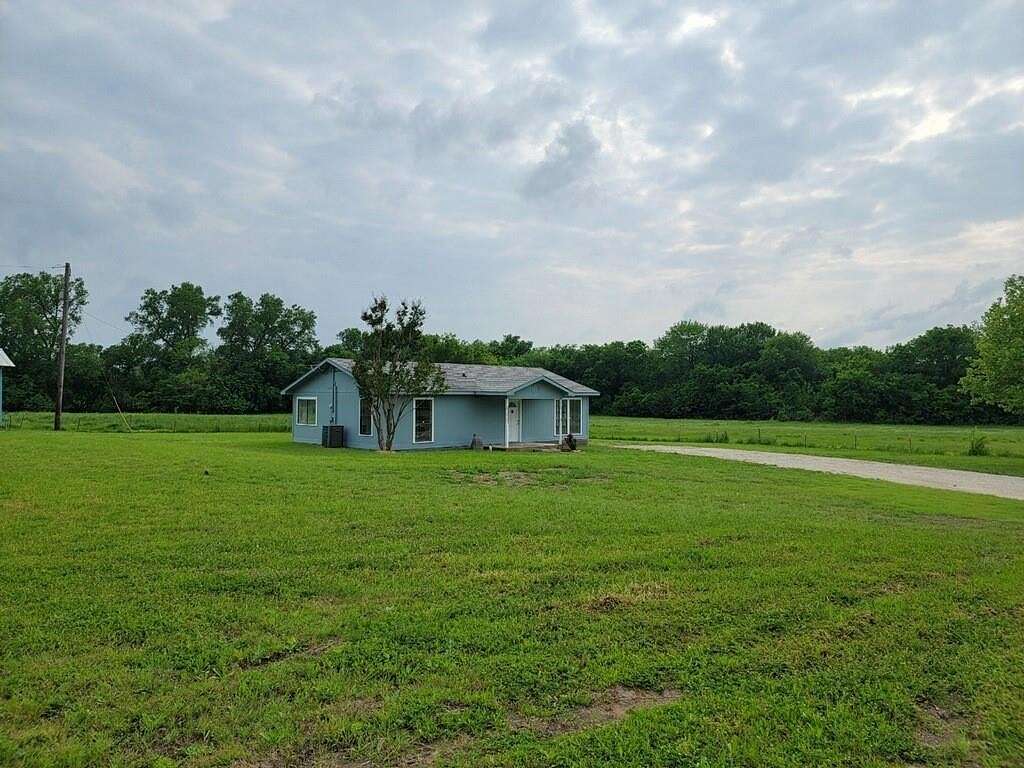 6.8 Acres of Residential Land with Home for Sale in Farmersville, Texas