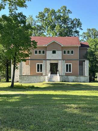 5.1 Acres of Land with Home for Sale in Roland, Arkansas