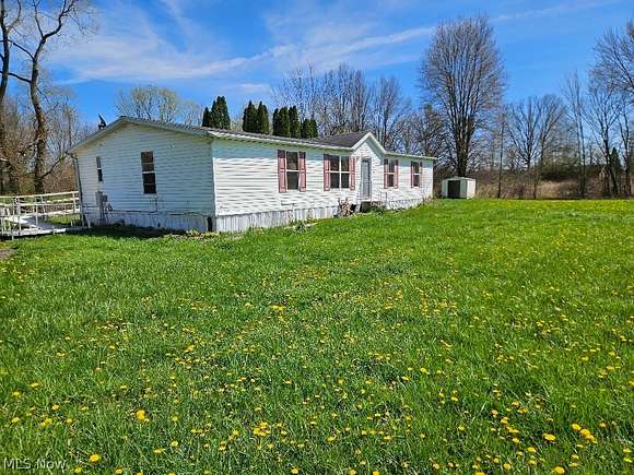 7.4 Acres of Residential Land with Home for Auction in Atwater, Ohio