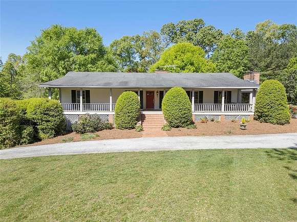 7.8 Acres of Residential Land with Home for Sale in Alpharetta, Georgia