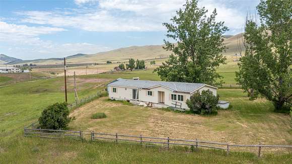 20 Acres of Agricultural Land with Home for Sale in Arlee, Montana