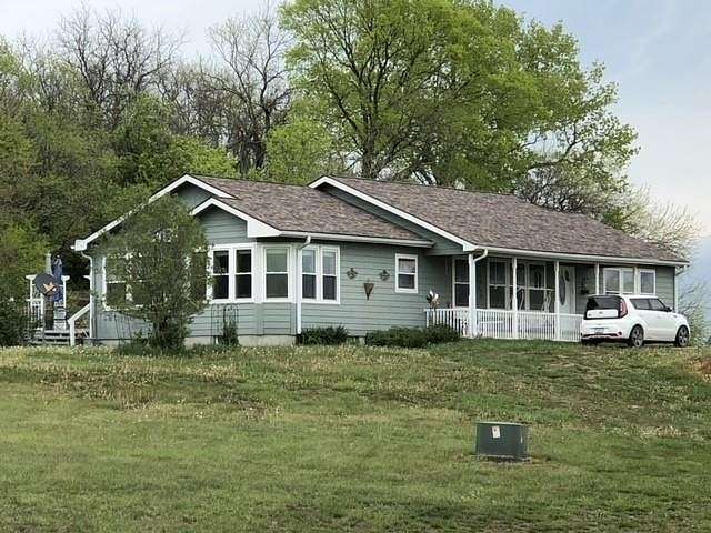 3.1 Acres of Residential Land with Home for Sale in Holden, Missouri