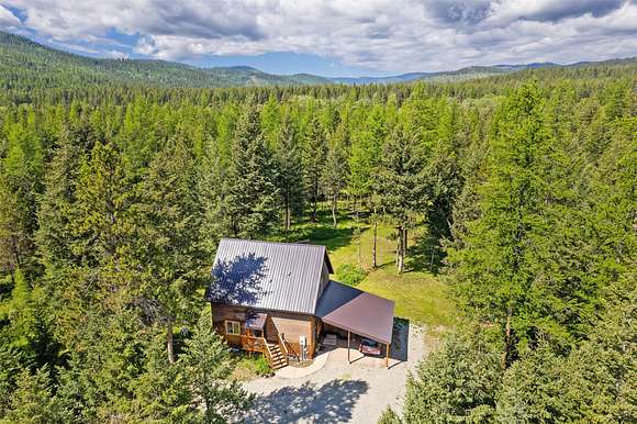 4.9 Acres of Residential Land with Home for Sale in Kalispell, Montana