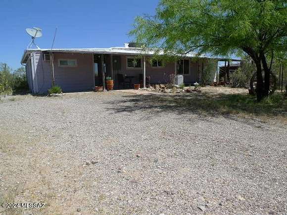 2.9 Acres of Residential Land with Home for Sale in Marana, Arizona
