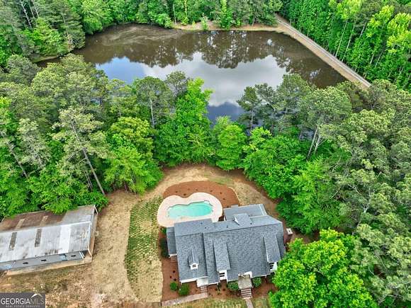 8.77 Acres of Land with Home for Sale in Hampton, Georgia