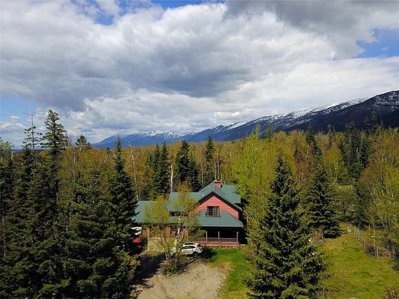 10.1 Acres of Recreational Land with Home for Sale in Bigfork, Montana