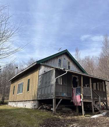 55.1 Acres of Recreational Land with Home for Sale in Ellenburg Center, New York