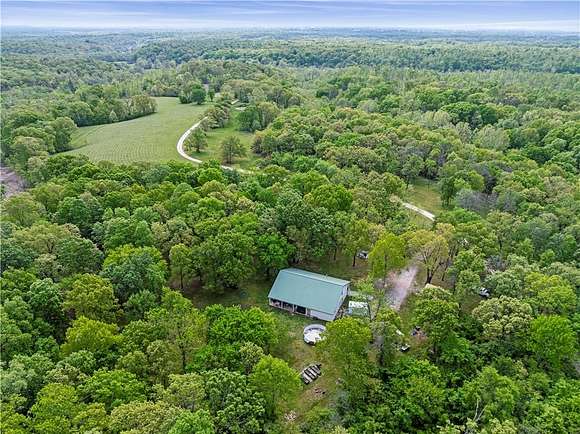 5 Acres of Residential Land with Home for Sale in Bentonville, Arkansas