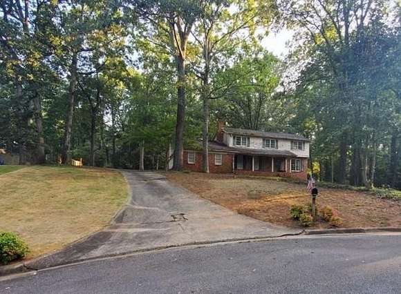 0.65 Acres of Residential Land with Home for Sale in Sandy Springs, Georgia