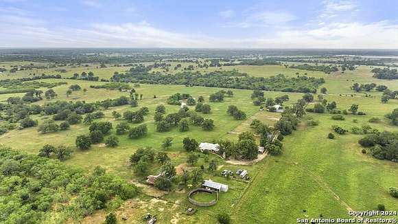27.5 Acres of Agricultural Land with Home for Sale in Luling, Texas