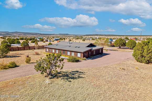 4.1 Acres of Residential Land with Home for Sale in Nutrioso, Arizona