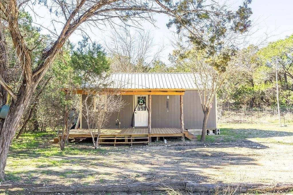 0.81 Acres of Residential Land with Home for Sale in Bandera, Texas