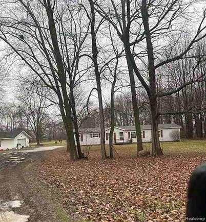 3.5 Acres of Residential Land with Home for Auction in Flint, Michigan