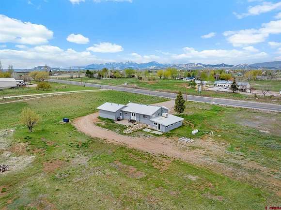 4.7 Acres of Residential Land with Home for Sale in Durango, Colorado