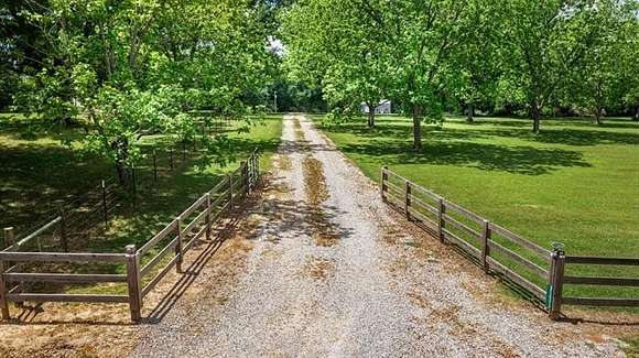 13.1 Acres of Land with Home for Sale in Covington, Louisiana