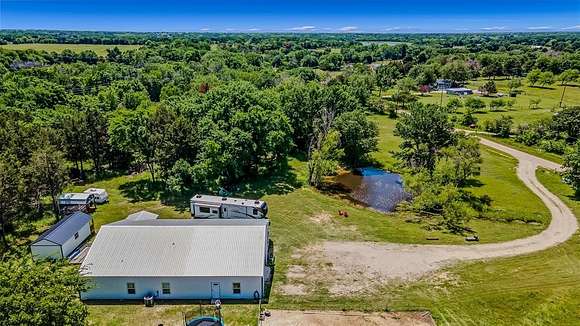 9.3 Acres of Residential Land with Home for Sale in Mabank, Texas