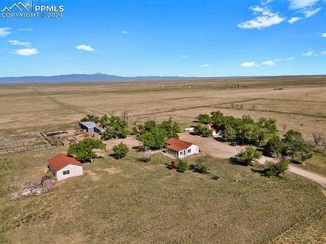 175 Acres of Land with Home for Sale in Yoder, Colorado