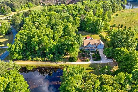 6.6 Acres of Residential Land with Home for Sale in Williamson, Georgia