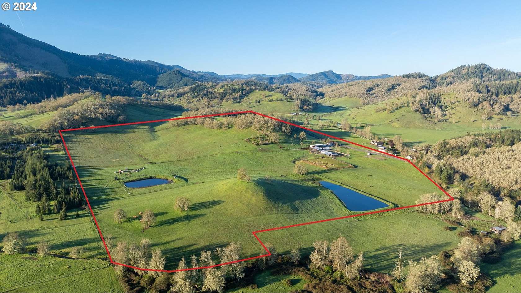 74.11 Acres of Agricultural Land with Home for Sale in Roseburg, Oregon