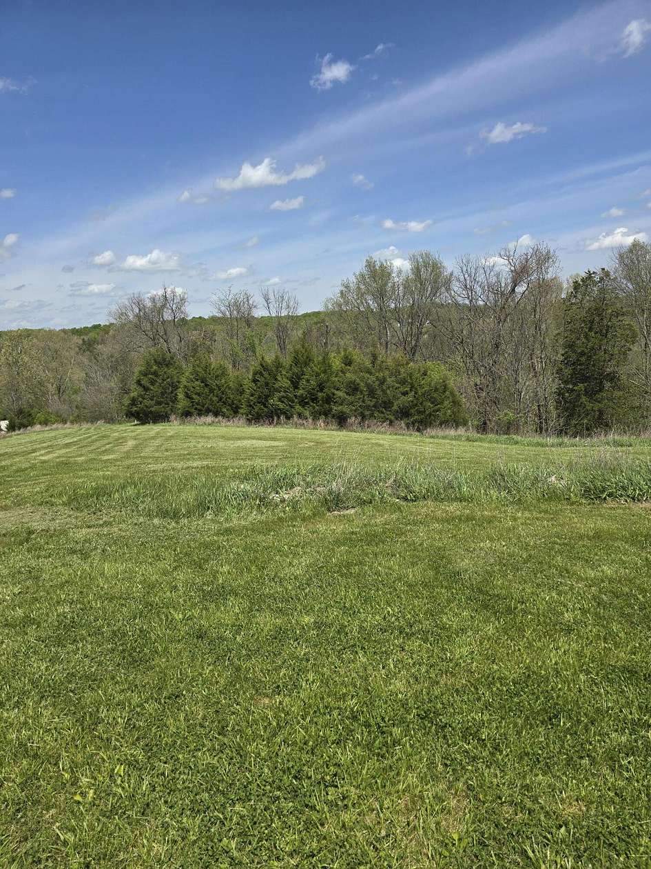 7.7 Acres of Land with Home for Sale in Lawrenceburg, Kentucky