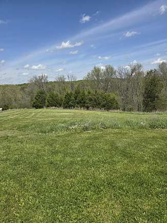 7.7 Acres of Land with Home for Sale in Lawrenceburg, Kentucky