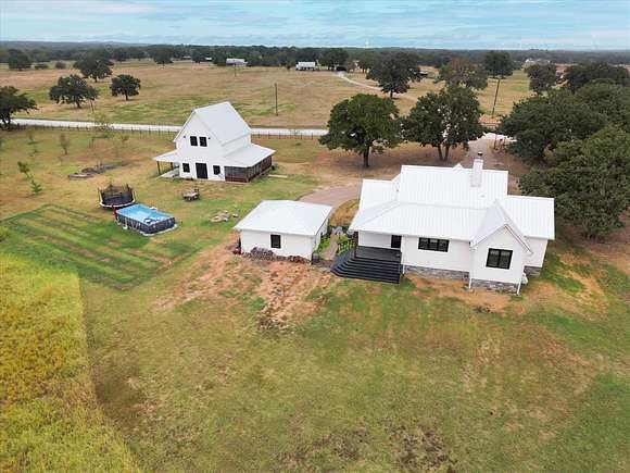 10.9 Acres of Land with Home for Sale in Collinsville, Texas