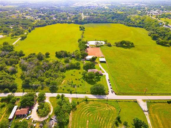 33.2 Acres of Agricultural Land with Home for Sale in Springtown, Texas