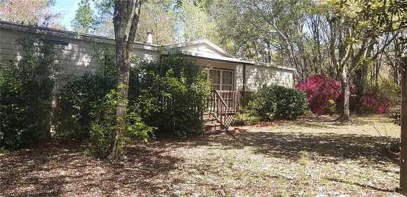 5.1 Acres of Land with Home for Sale in Dunnellon, Florida
