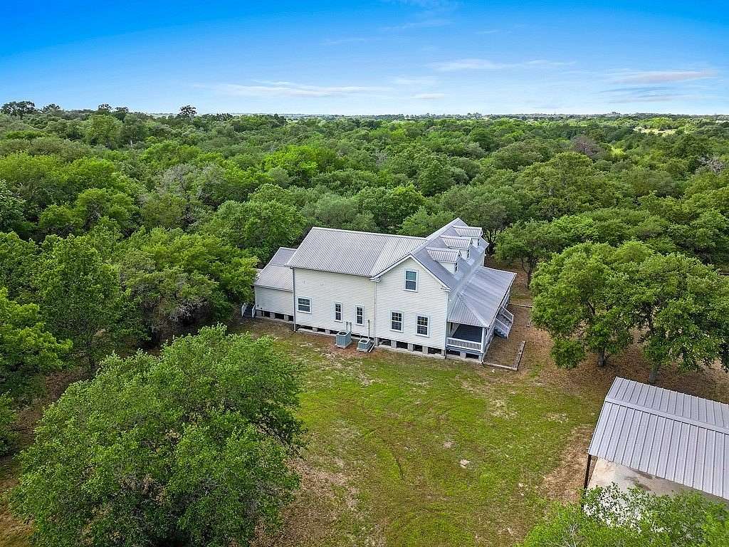 24.364 Acres of Agricultural Land with Home for Sale in Ledbetter, Texas