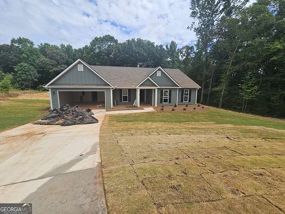 4.8 Acres of Residential Land with Home for Sale in Winterville, Georgia