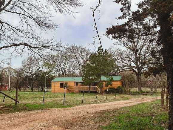 9.41 Acres of Land with Home for Sale in Bogata, Texas