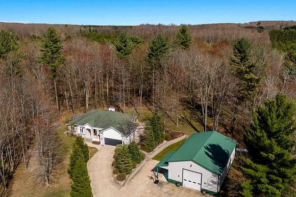 10 Acres of Recreational Land with Home for Sale in Fife Lake, Michigan