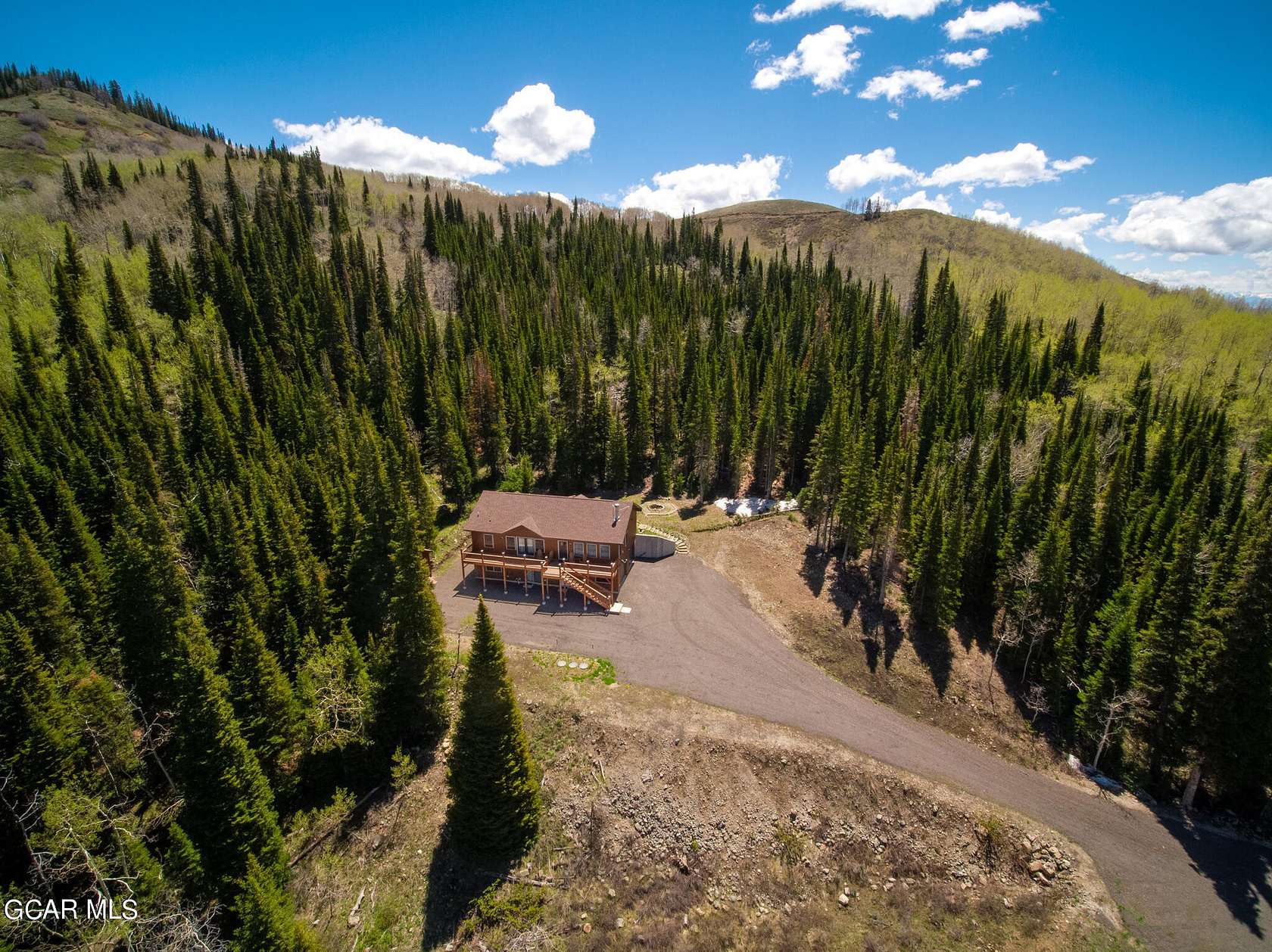6.4 Acres of Residential Land with Home for Sale in Kremmling, Colorado