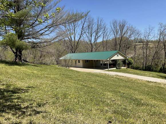 16 Acres of Land with Home for Sale in Olive Hill, Kentucky